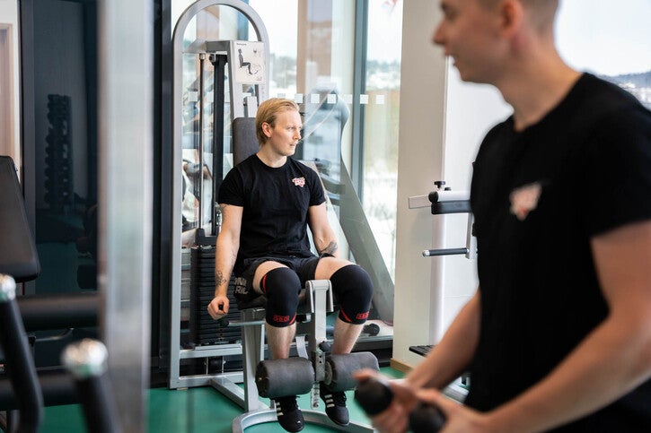 Employees work out in Hot Screen's Gym