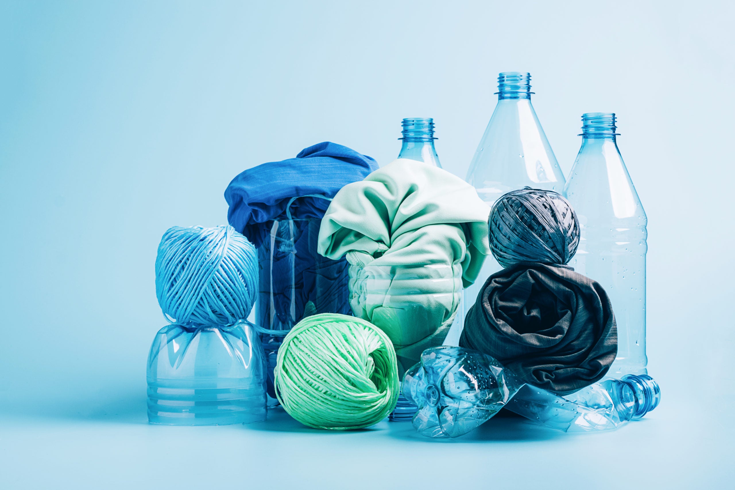 empty-plastic-bottle-and-various-fabrics.jpg